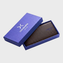 Brown leather flat glasses case in a gift box with Lensrappa branding on a white background