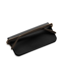 Black leather eyewear case protecting a pair of glasses.