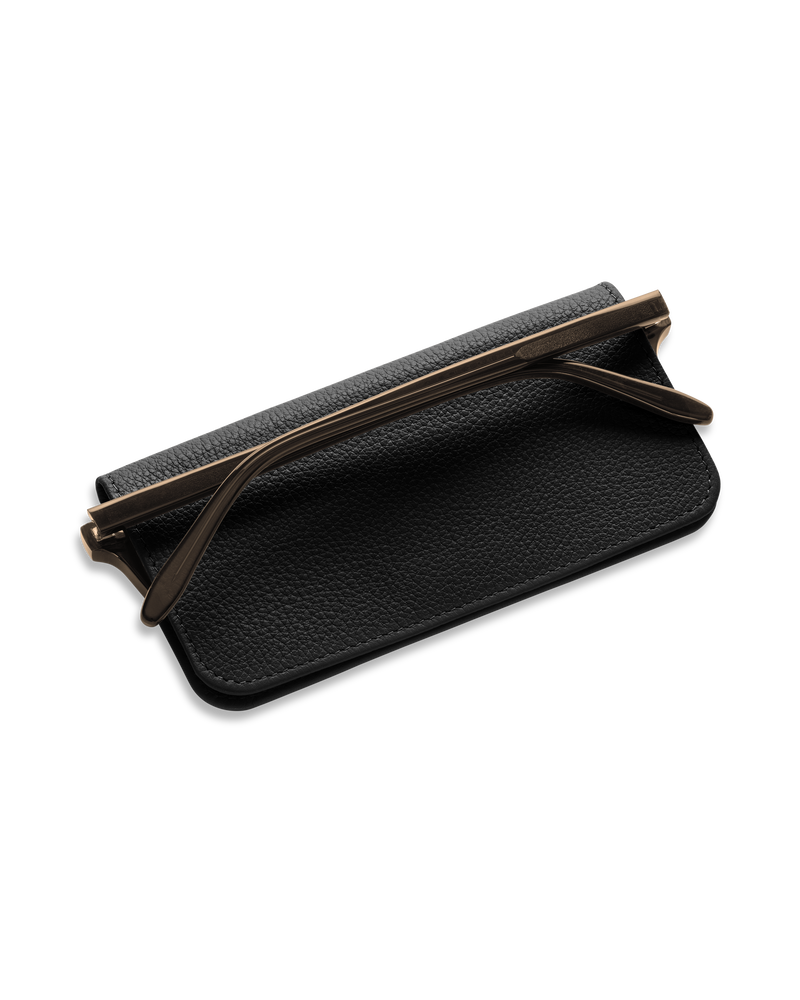 Black leather eyewear case protecting a pair of glasses.